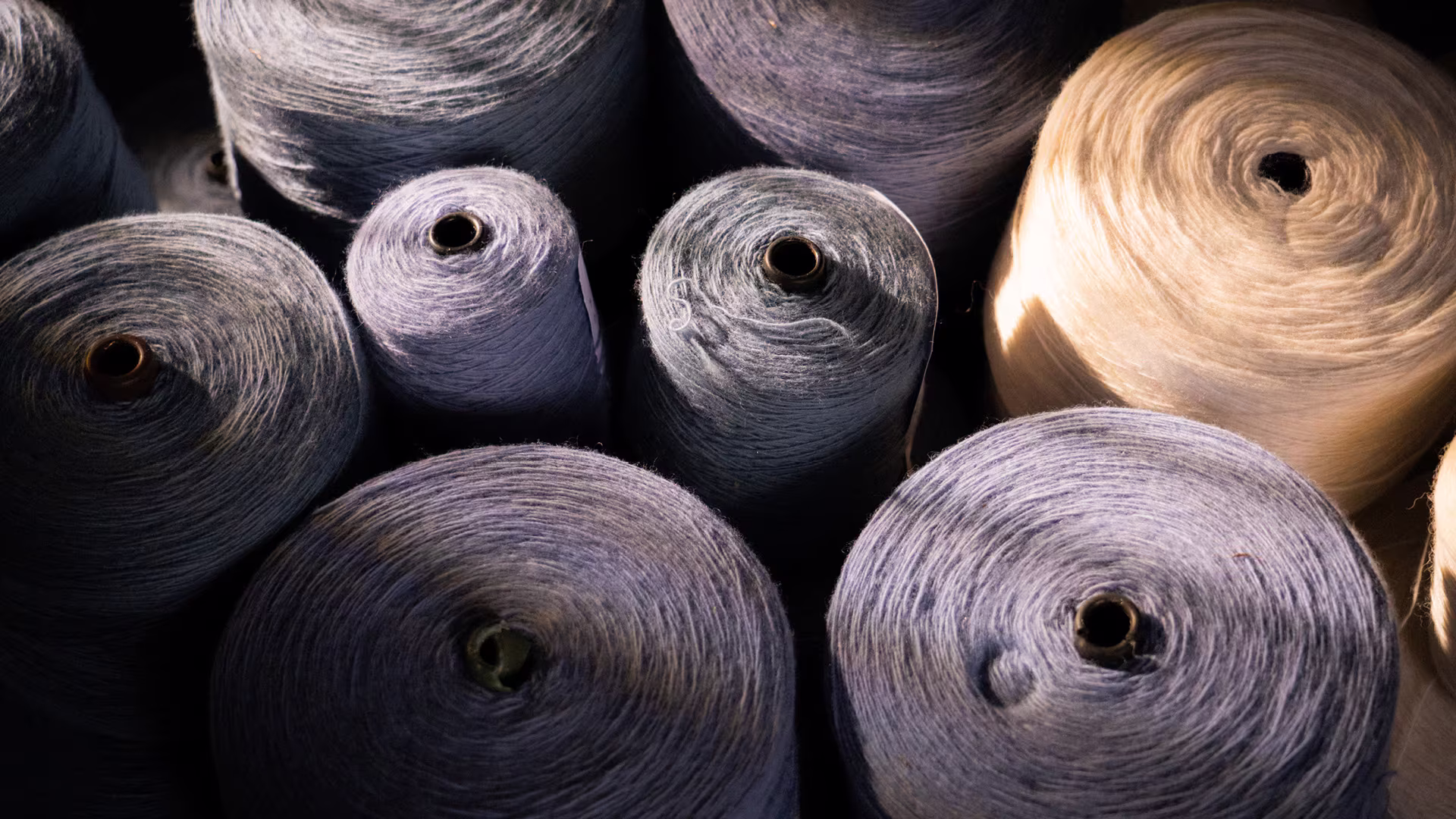 TCC artisans preparing yarns for custom carpet design